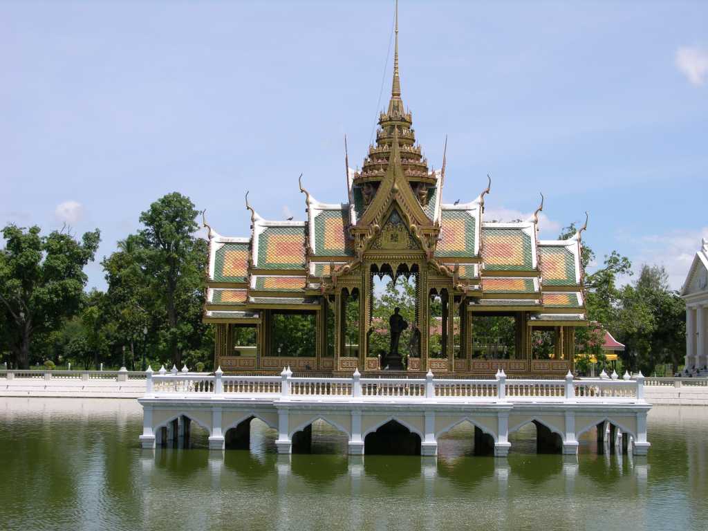 Bangkok 06 03 Ayutthaya Bang-Pa In Summer Royal Palace Just 60km north of Bangkok, the current Bang-Pa In, the summer Royal Palace, dates from the reign of King Chulalongkorn (1868-1910) when most of the buildings standing today were constructed. Today the palace is used occasionally by the King and Queen as a residence and for holding receptions and banquets. In the centre of a small lake at Bang-Pa In sits Aisawan Thiphya-Art, a pavilion with four porches and a spire roof. It is a copy of one in the Grand Palace.